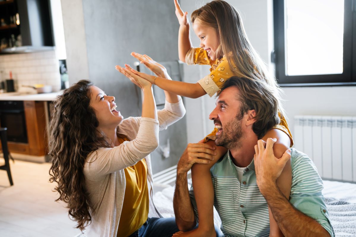 Happy family having fun time at home together